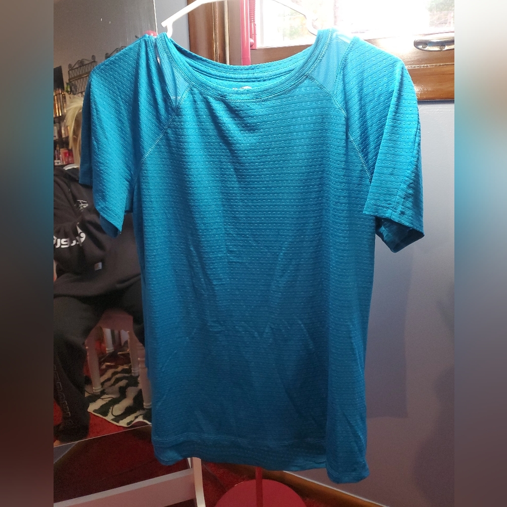 Blue Avia athletic tee. Size small but fits like a medium. Lightweight.